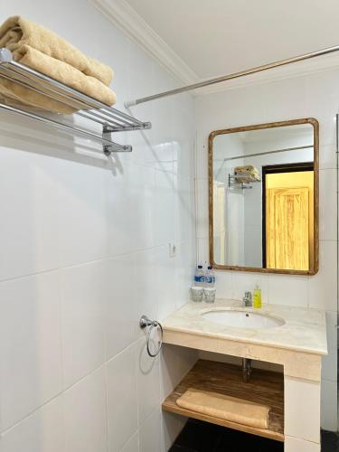 Koupelna v ubytování Radha Bali Hotel