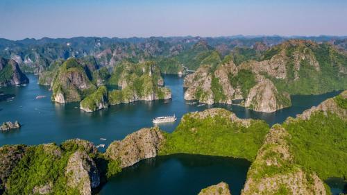 an aerial view of a river surrounded by mountains at Indochine Cruise Lan Ha Bay in Ha Long