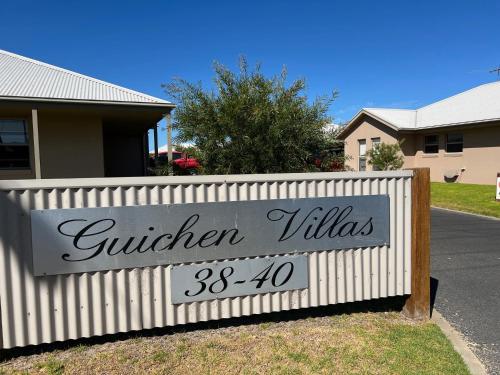 a sign that reads whisper villas in front of a house at Guichen Villa 3 - Wi-Fi Pets welcome outside in Robe