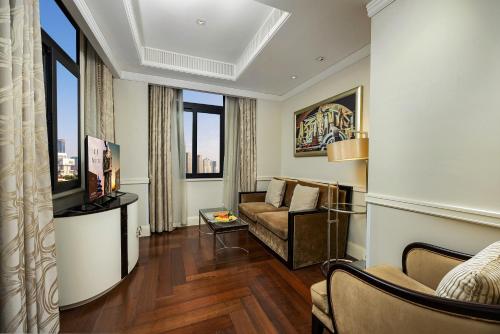Coin salon dans l'établissement 上海外滩锦江都城新城饭店 Metropolo Xin Cheng Hotel, The Bund Shanghai
