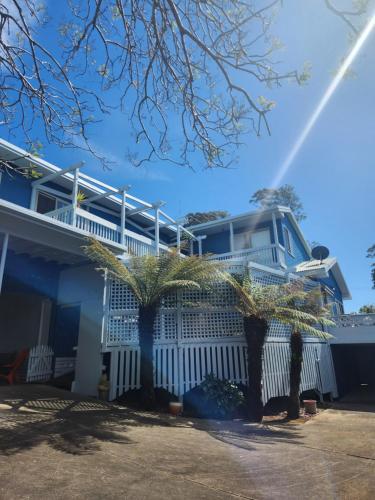 a truck parked on the side of a house at Dolphinview in Denhams Beach