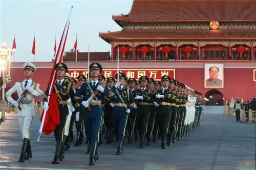 a military parade in front of a red building at Jingfang Building Boutique Smart Hotel - near Beijing Tiananmen Square,the Forbidden City,Wangfujing Street in Beijing