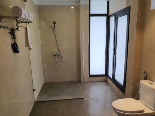 Ένα μπάνιο στο Ivory Villa & Resort
