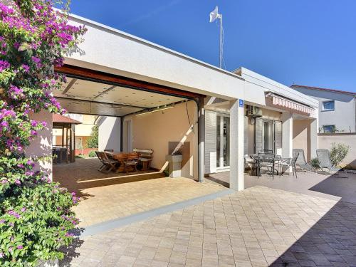 Holiday home with terrace and outdoor kitchen