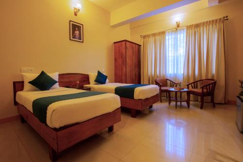 Katil atau katil-katil dalam bilik di Cross Roads Inn
