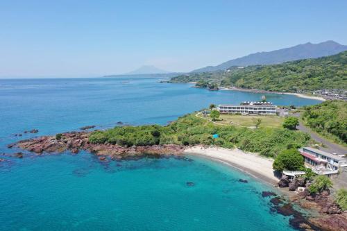 an aerial view of a beach with a resort at YUKUSA OHSUMI UMI no GAKKO in Kanoya