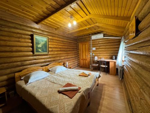 Postel nebo postele na pokoji v ubytování ЕЛІТ