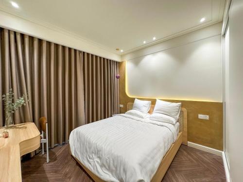 Ένα ή περισσότερα κρεβάτια σε δωμάτιο στο Luxury Apartment Altara