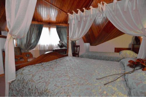 Katil atau katil-katil dalam bilik di Hotel Apollon