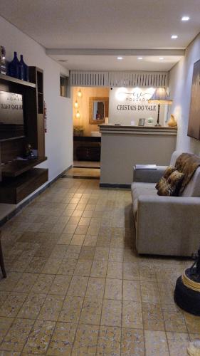 Η κουζίνα ή μικρή κουζίνα στο SUITE 12 em POUSADA CRISTAIS DO VALE para Casal e 2 solteiros
