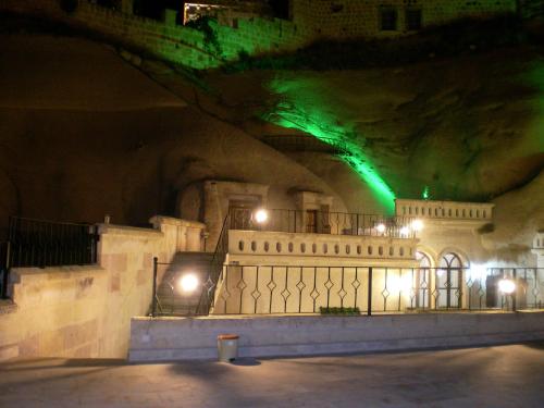 a building with green lights in a tunnel at Nature Park Cave Hotel in Göreme