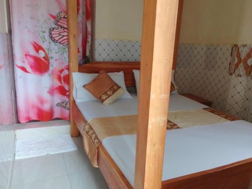 a pair of bunk beds in a room at Blessing Holiday Homes - Diani Beach in Diani Beach