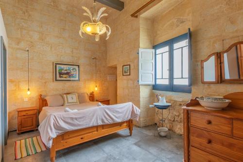 Postel nebo postele na pokoji v ubytování Casa Felini - Homestay