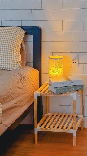 Postel nebo postele na pokoji v ubytování La Casa Di Dicembre HCMC