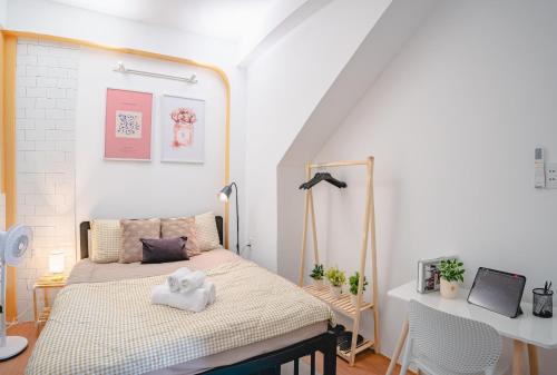 Postel nebo postele na pokoji v ubytování La Casa Di Dicembre HCMC