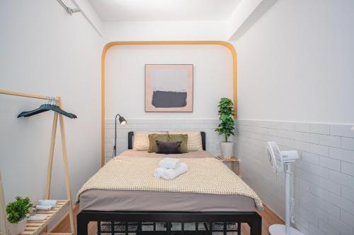 Postel nebo postele na pokoji v ubytování La Casa Di Dicembre HCMC