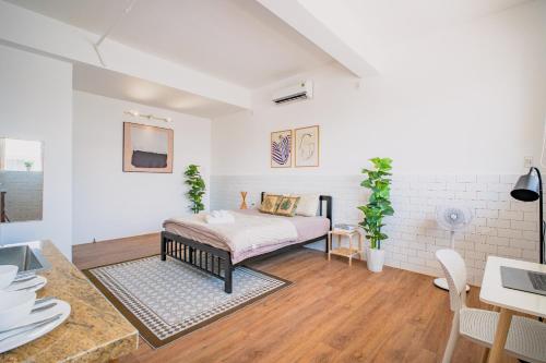 Postel nebo postele na pokoji v ubytování La Casa Di Dicembre HCMC