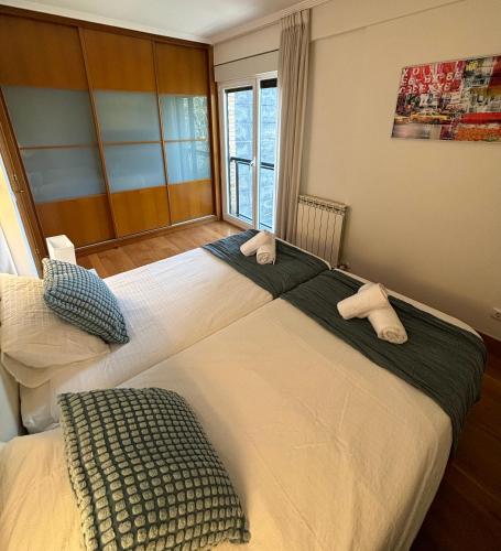 Postel nebo postele na pokoji v ubytování Ulia Apartments- Garden Boutique