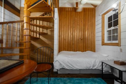 Postel nebo postele na pokoji v ubytování AK Resort ISHIGAKI