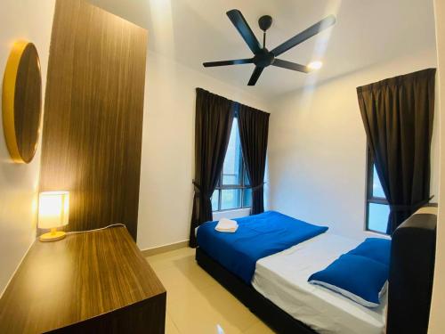 a bedroom with a bed and a ceiling fan at Home Garden - Palas Horizon, Brinchang Cameron Highlands in Cameron Highlands