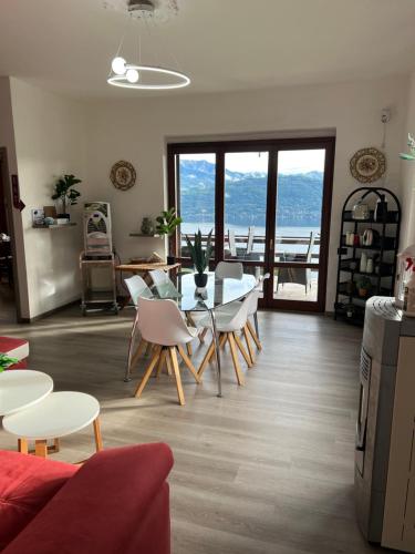 a living room with a table and chairs at Panorama in Someraro