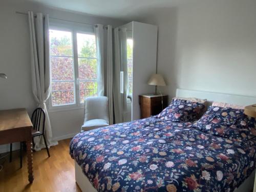 Cama ou camas em um quarto em Grand Paris Sud Chbre privée