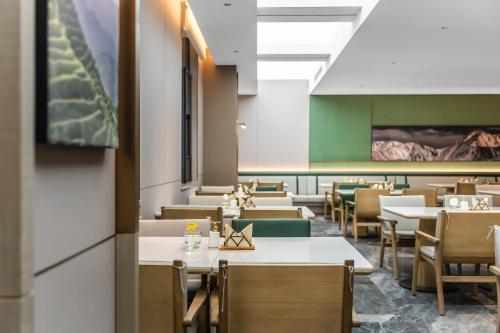 Restoranas ar kita vieta pavalgyti apgyvendinimo įstaigoje Atour Hotel Chongqing Liangjiang Happiness Plaza