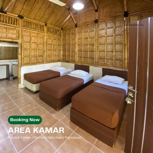 a room with three beds and a bathroom at Bamboo Sanctuary Pancawati Resort Bogor in Ciherangsating