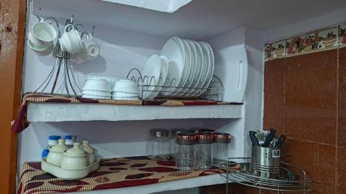 Кухня или мини-кухня в Welcomebe
