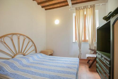Postel nebo postele na pokoji v ubytování Le Case di Simonetta - HelloElba