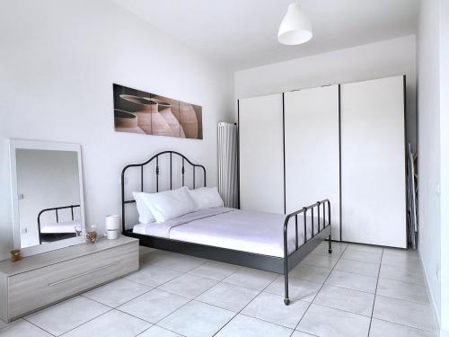 Tempat tidur dalam kamar di UR NEST Ferravilla