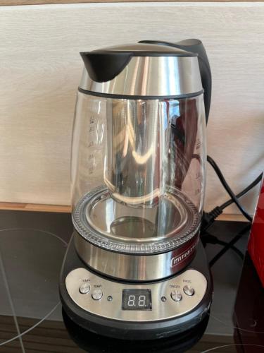 a blender sitting on top of a table at Appartement de charme avec balcon au pied des commerces in Béziers