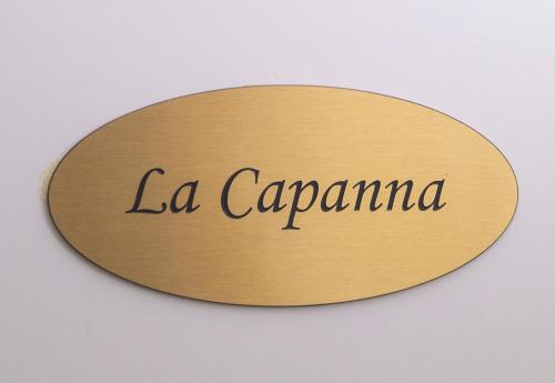 a sign with the name la cazarana on it at Il Colombé B&B in Barzanò