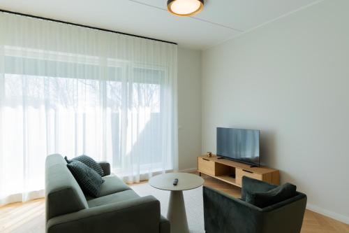 โทรทัศน์และ/หรือระบบความบันเทิงของ Seafront Apartment