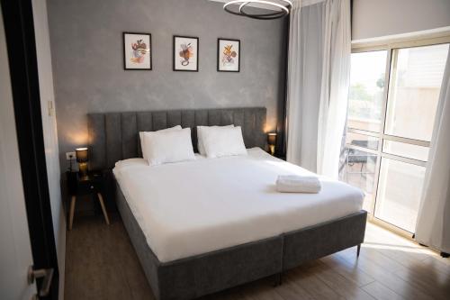 Postel nebo postele na pokoji v ubytování צימר אדל - Zimmer Adel