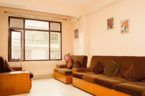 Posezení v ubytování Hotel Siddhi Vinayak Regency, Mg Marg