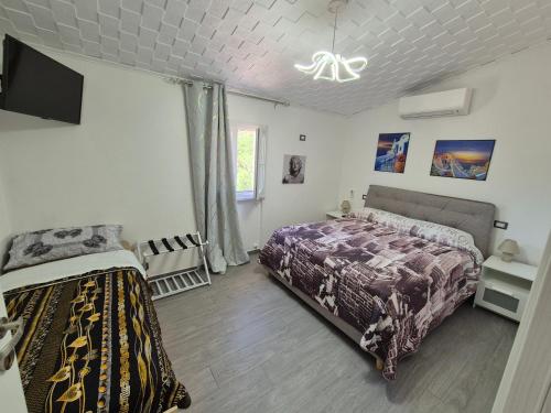 Giường trong phòng chung tại Casa Vacanze Villa DaLu con piscina