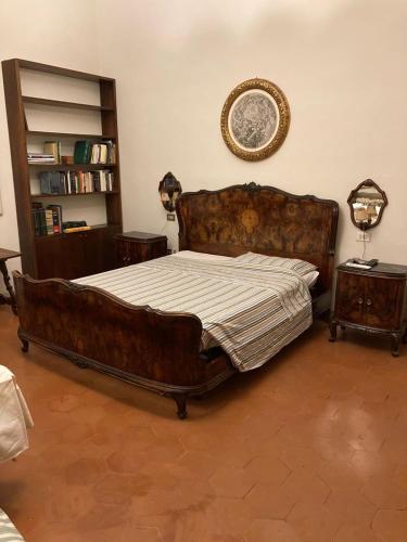 Een bed of bedden in een kamer bij Villa Grandi B&B