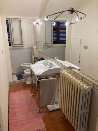 Een badkamer bij Villa Grandi B&B