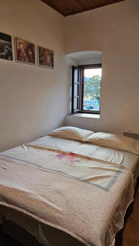 Postel nebo postele na pokoji v ubytování Apartments Vujošević