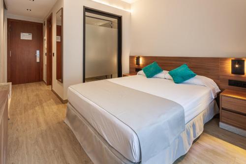 Una cama o camas en una habitación de DWO Sirius - Adults Only