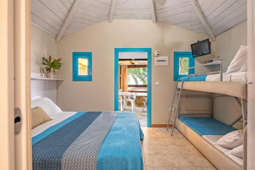Postel nebo postele na pokoji v ubytování Resort Baia del Silenzio