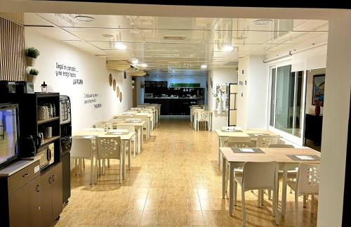 Kuchyň nebo kuchyňský kout v ubytování Hotel Alaska