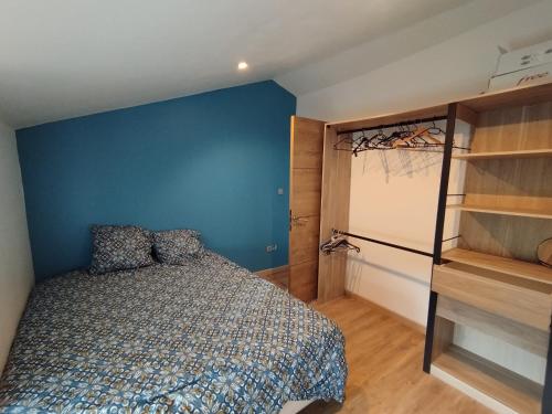 Een bed of bedden in een kamer bij Maison de vacances