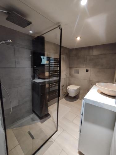 Een badkamer bij Maison de vacances