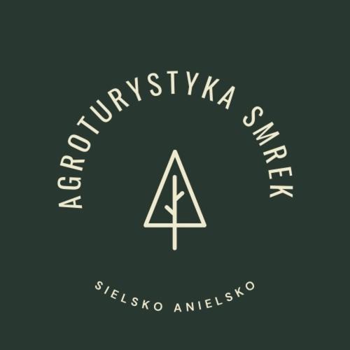 a logo for a music company with a triangle in it at Smrek Sokolec Agroturystyka in Ludwikowice Kłodzkie