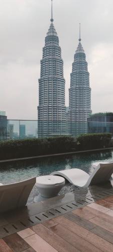 a view of a city with tall buildings at Star Residence Suite KLCC in Kuala Lumpur
