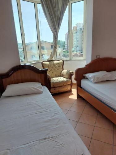 Postel nebo postele na pokoji v ubytování Apartments Vila Cala