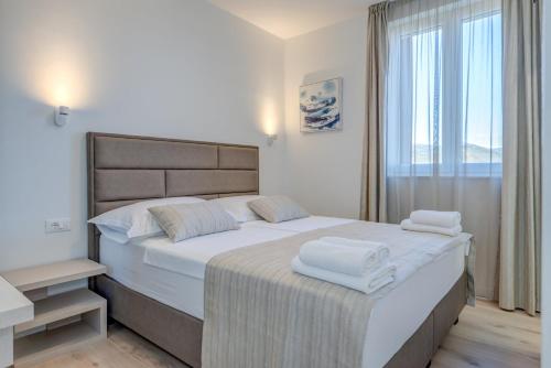 Postel nebo postele na pokoji v ubytování Villa Modea with Heated Pool