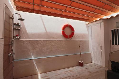 Ένα μπάνιο στο Adosado Familiar Los Enebros